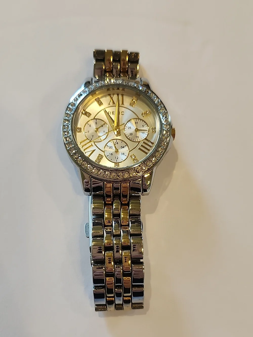 Relic Gold And Silver Tones Watch With Crystal Bezel And Crystal Numerals